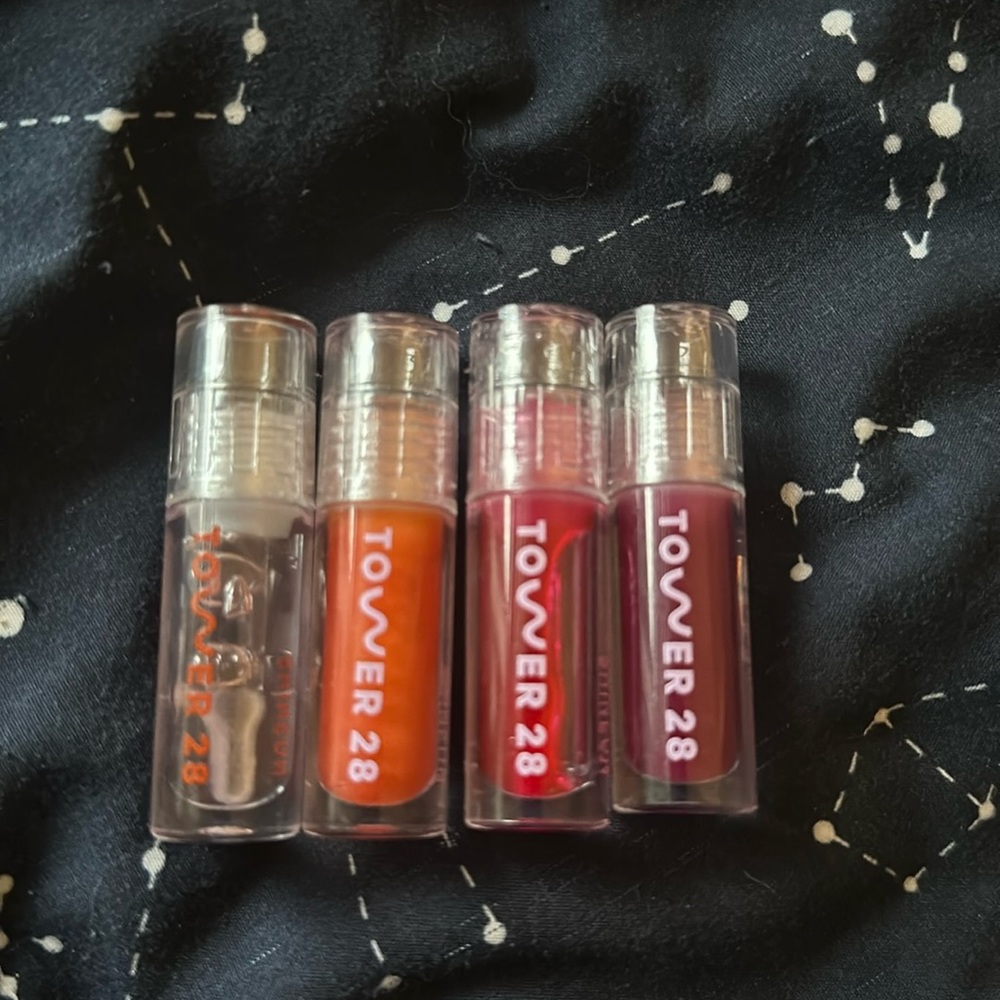 Set of 4 Tower 28 mini lip jellies in shades Chill, Fearless, XOXO, and Fire.